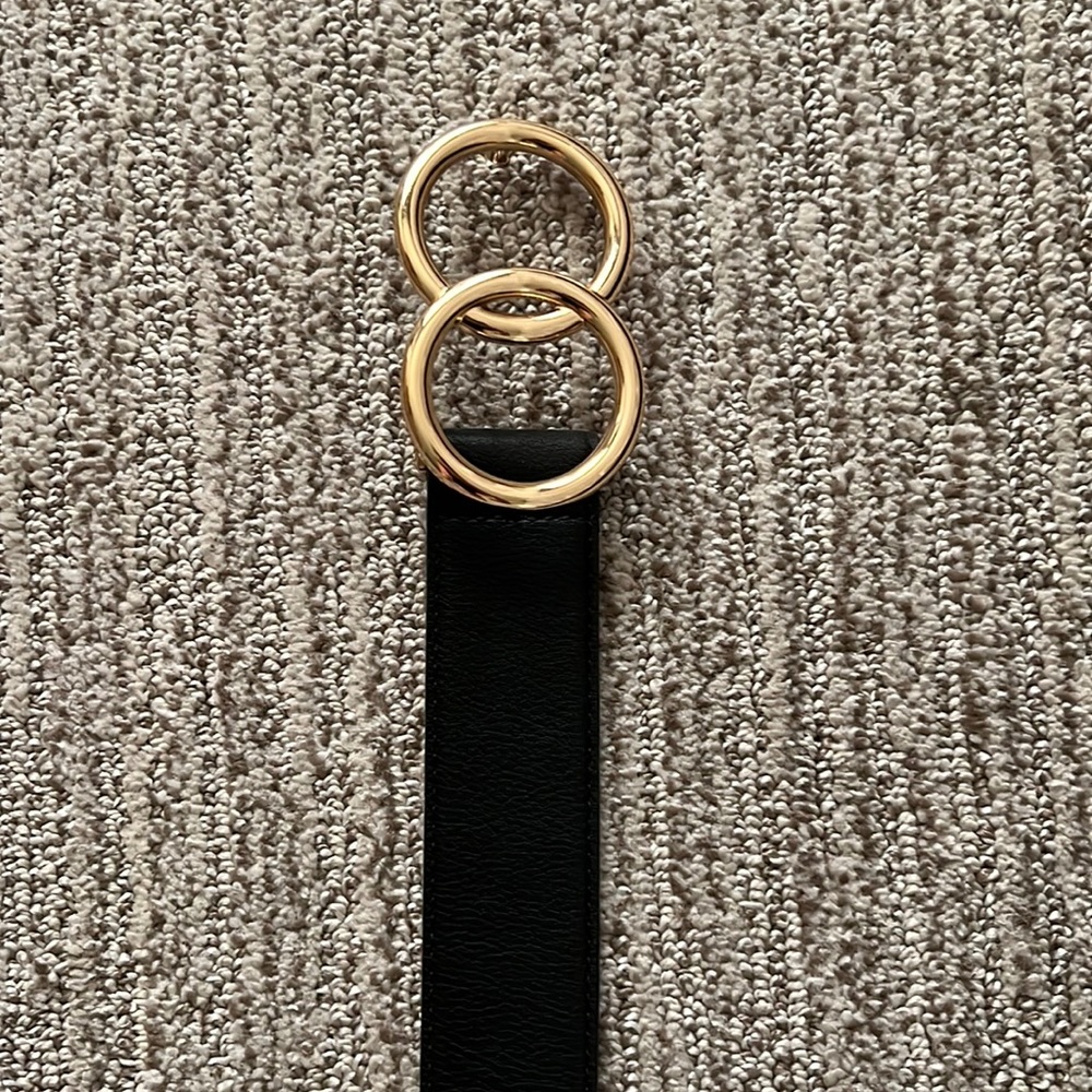Express belt, size XS, black and gold.